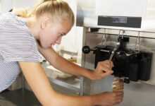 A girl running an Ice Cream Machine