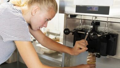 A girl running an Ice Cream Machine