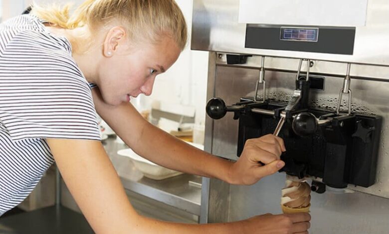 A girl running an Ice Cream Machine