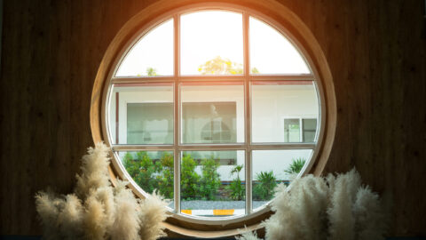 round timber window